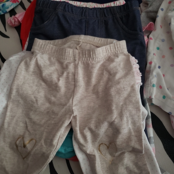 Baby girl clothing bundle newborn to 12 month. Includes bibs, hats, and socks - Picture 10 of 15